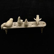 Cover image of Untitled (Ivory birds on an ivory table)